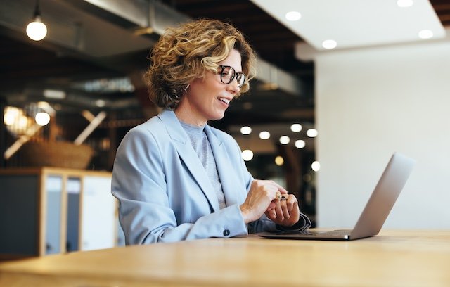 Professional woman having an online meeting on a laptop